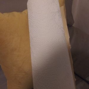 Embossed drapes and matching wallpaper